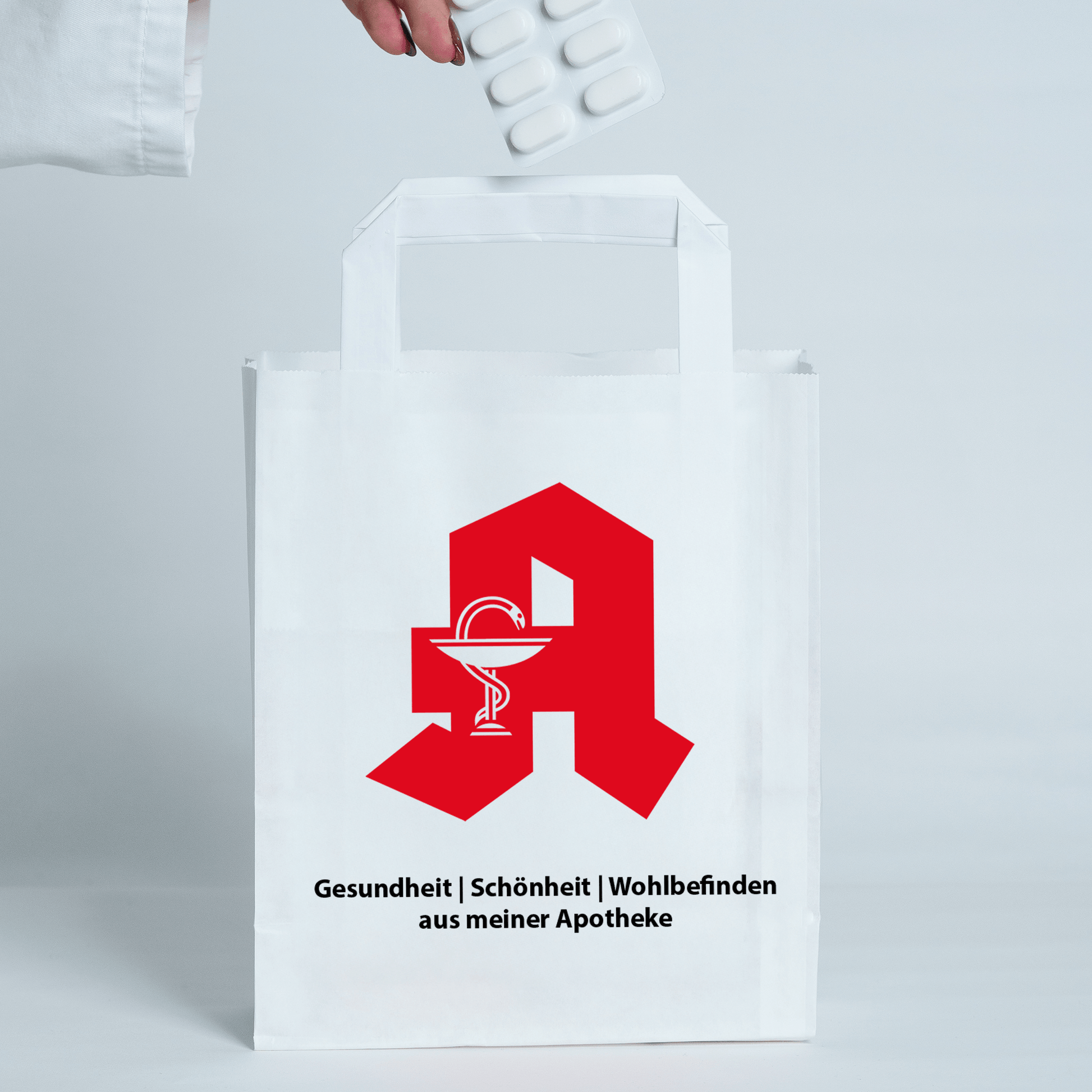 Apothekentasche aus Papier Größe M in Anwendung in Ihrer Apotheke